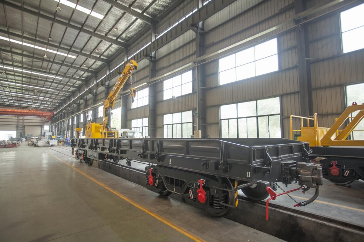 Crane mounted flatcar