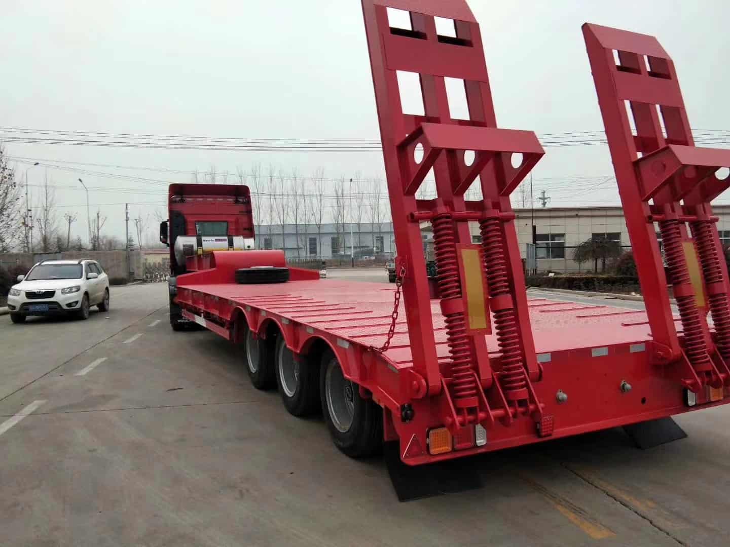 Mechanical loading ramp low bed trailer