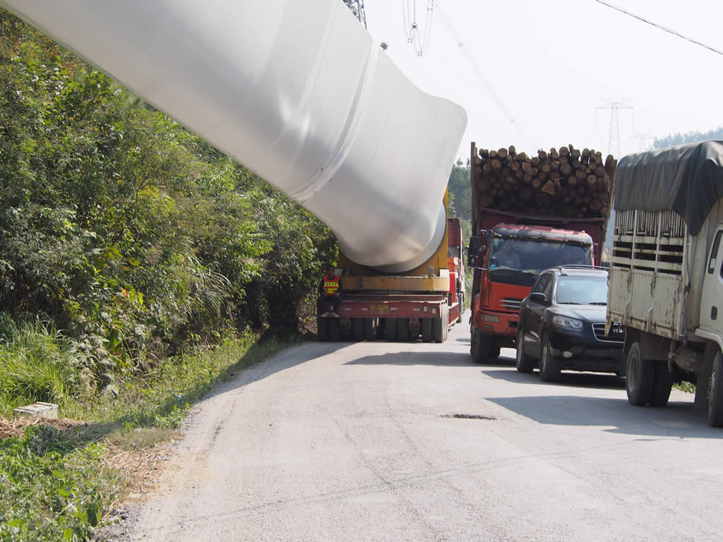 Windmill blade adapter trailer needs less public road resources